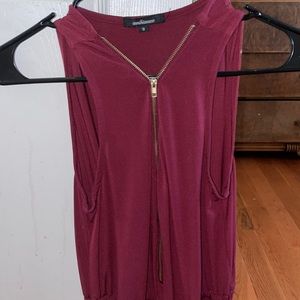 Jumpsuit with pockets and gold zipper